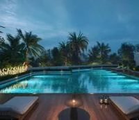 Swimming pool at night with Casagrand signage, artist impression